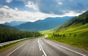 Open Road with mountain view, reliable auto transport - Open Road Carriers