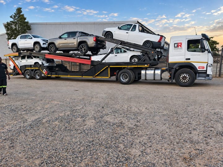 Open Road Carriers — cars on a vehicle carrier.