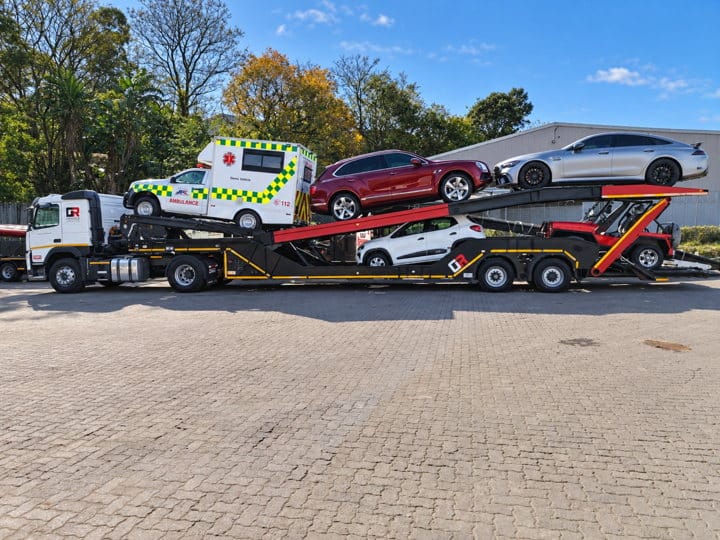 Open Road Carriers — vehicles loaded for transport.