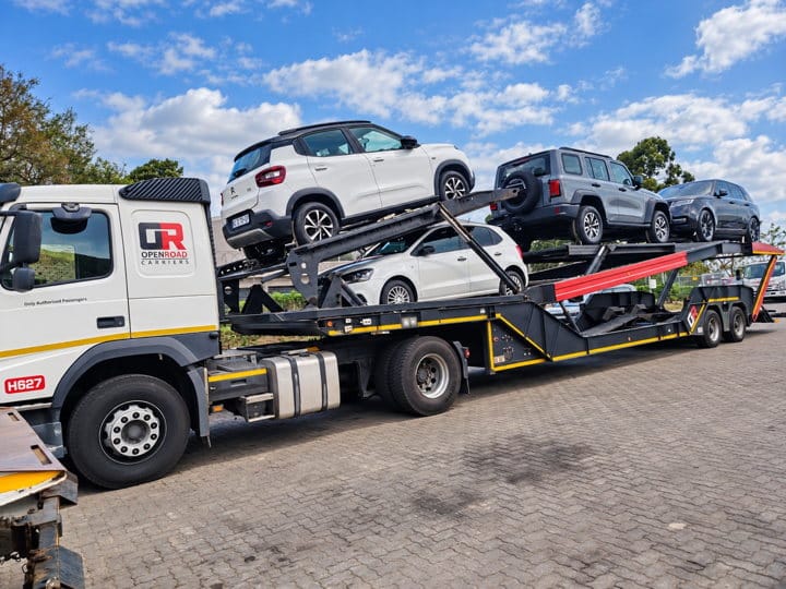Open Road Carriers — cars and SUVs.