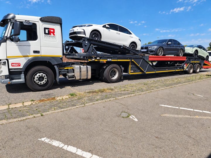 Open Road Carriers — cars on a vehicle carrier.