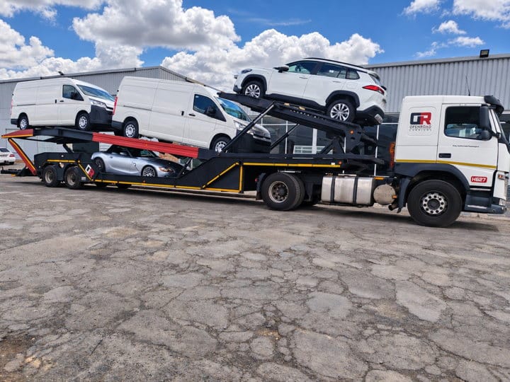 Open Road Carriers — vehicles loaded on a carrier.