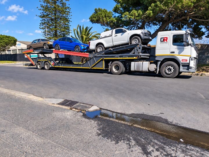 Open Road Carriers — vehicles on a transporter.