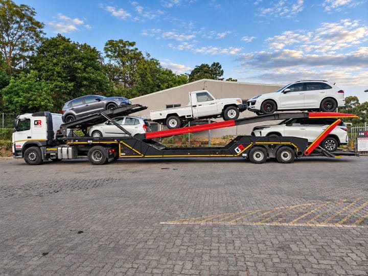 Open Road Carriers — cars on a transporter.