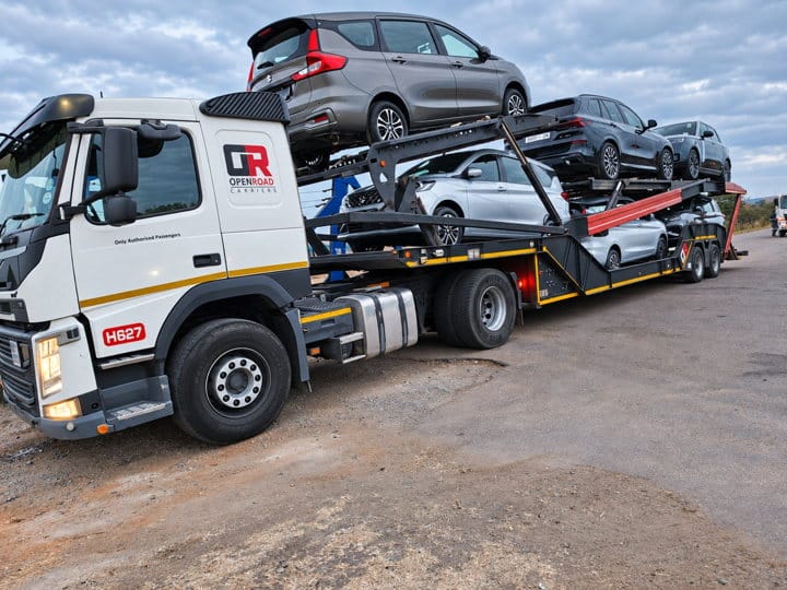 Open Road Carriers — cars loaded for delivery.