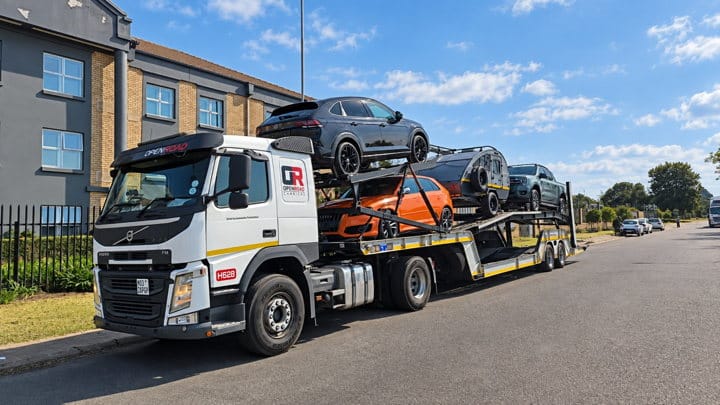 Open Road Carriers — cars on a transporter.