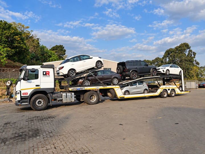 Open Road Carriers — a caravan on a transporter.