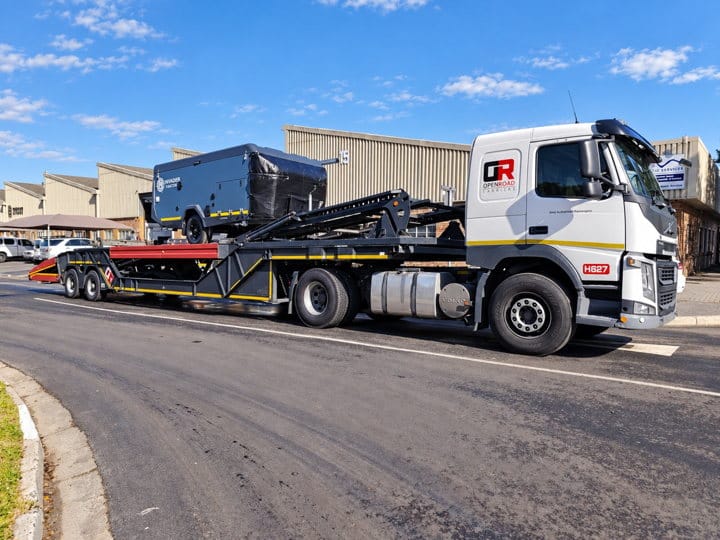 Open Road Carriers — a box trailer on a carrier.
